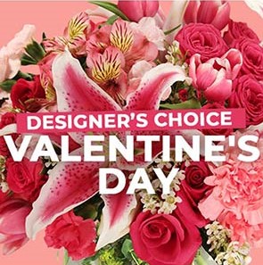 “Designer’s choice Valentine’s Day” written over a selection of pink Valentines Day flowers