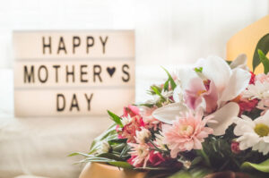 'Happy Mothers Day' sign with flowers
