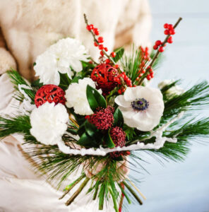 winter bouquet in the hands of a bride